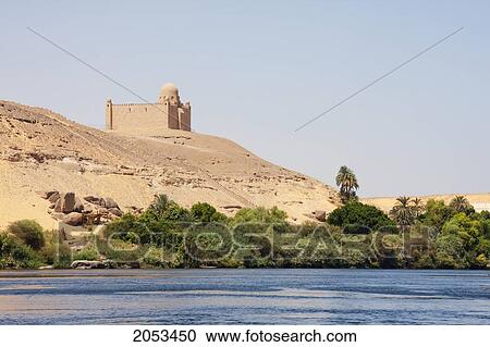 Stock Image - Nile River And Mausoleum Of Mohammed Shah Aga Khan, Aswan, Egypt. Fotosearch