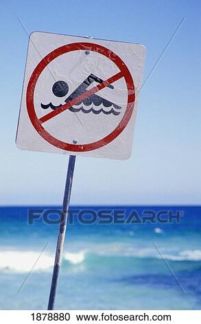 Stock Image - No Swimming Sign At Trigg Island Beach. Fotosearch