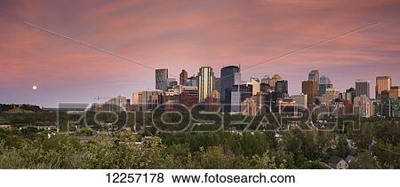 Stock Photo - North American city skyline at dusk; Calgary, Alberta, Canada. Fotosearch