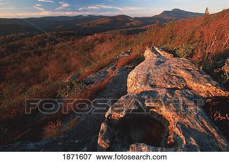 North Carolina, United States Of America; View From Blue Ridge Parkway With Sunset Light On Autumn Colors And Grandfather Mountain In The Background View Large Photo Image Stock Photo - North Carolina, United States Of America; View From Blue Ridge Parkway With Sunset Light On Autumn Colors And Grandfather Mountain In The Background. Fotosearch