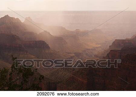Stock Photograph - North Rim Of Grand Canyon In The Rain; Kanab Utah Usa. Fotosearch
