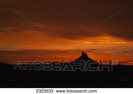 North Six Shooter desert tower at sunset; Indian Creek, Utah, USA View Large Photo Image Stock Image - North Six Shooter desert tower at sunset; Indian Creek, Utah, USA. Fotosearch