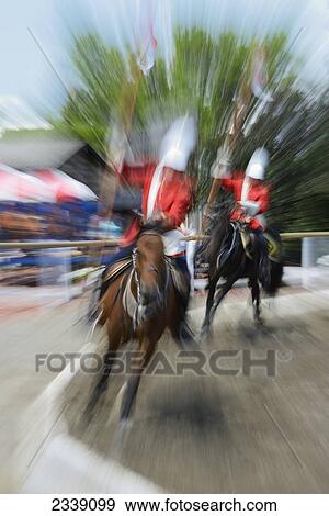 Stock Photo - North-West Mounted Police Musical Ride At The Fort Museum; Fort Mcleod, Alberta, Canada. Fotosearch
