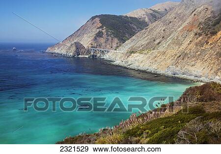 Northern California, Big Sur, View Of Bixby Bridge Along The Coast. View Large Photo Image Stock Photo - Northern California, Big Sur, View Of Bixby Bridge Along The Coast.. Fotosearch