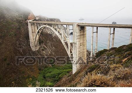 Northern California, Big Sur, View Of Bixby Bridge Along The Coast. View Large Photo Image Stock Photograph - Northern California, Big Sur, View Of Bixby Bridge Along The Coast.. Fotosearch