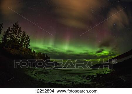 Picture - Northern lights reflecting in ocean at Mill Bay Beach, Kodiak, Alaska. Fotosearch