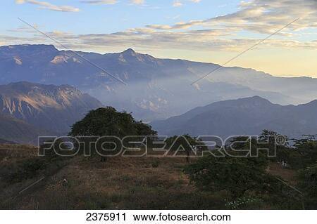 Stock Image - Northern Mountain Range of Peru at the headwaters of the Jequetepeque River, as seen from Kuntur Wasi, Cajamara, Peru. Fotosearch