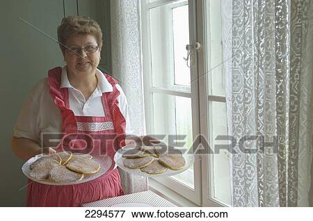 Norway, Moere og Romsdal, Home made cakes at Alnes lighthouse near Alesund; Godoy Island View Large Photo Image Stock Photo - Norway, Moere og Romsdal, Home made cakes at Alnes lighthouse near Alesund; Godoy Island. Fotosearch