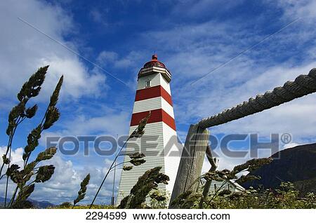 Norway, Moere og Romsdal, Low angle view of Alnes lighthouse near Alesund; Godoy Island View Large Photo Image Stock Photo - Norway, Moere og Romsdal, Low angle view of Alnes lighthouse near Alesund; Godoy Island. Fotosearch