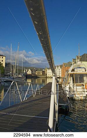 Picture - Norway, More og Romsdal, Yacht by jetty; Alesund. Fotosearch
