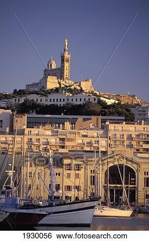 Notre Dame De La Garde And Harbour At Sunset; Marseille, France View Large Photo Image Stock Photograph - Notre Dame De La Garde And Harbour At Sunset; Marseille, France. Fotosearch