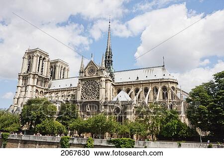 Stock Image - Notre Dame De Paris Cathedral, As Seen From The Left Bank Of The Seine, Paris, France. Fotosearch
