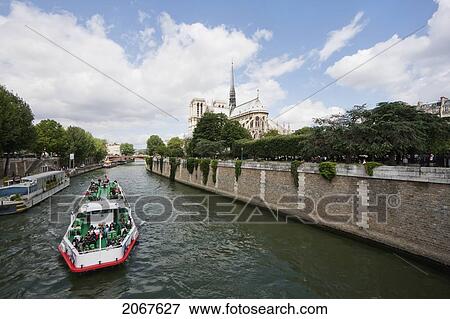 Stock Photo - Notre Dame De Paris Cathedral, As Seen From The Left Bank Of The Seine, Paris, France. Fotosearch