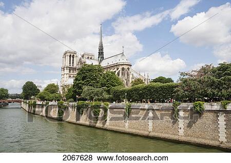 Stock Photo - Notre Dame De Paris Cathedral, As Seen From The Left Bank Of The Seine, Paris, France. Fotosearch