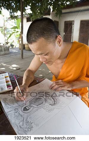 Novice Monk Drawing Pictures Of Buddha, Luang Prabang, Laos View Large Photo Image Stock Image - Novice Monk Drawing Pictures Of Buddha, Luang Prabang, Laos. Fotosearch
