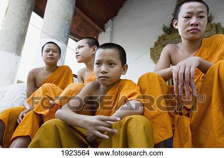 Picture - Novice Monks Relaxing. Fotosearch