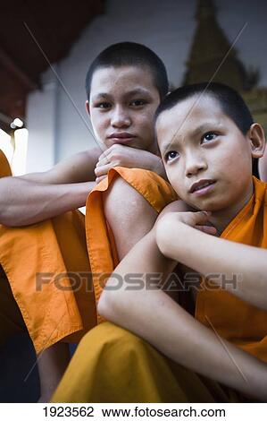 Stock Image - Novice Monks Relaxing. Fotosearch