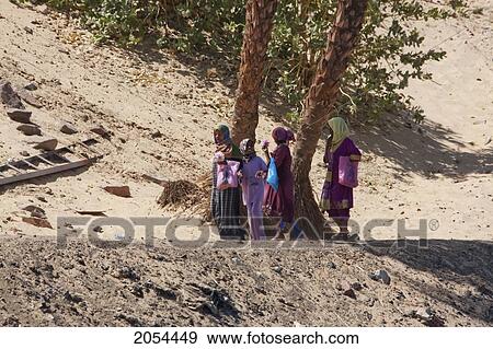 Nubian Girls Near The Village Of Nag Gharb Siheil, Aswan, Egypt View Large Photo Image Stock Photo - Nubian Girls Near The Village Of Nag Gharb Siheil, Aswan, Egypt. Fotosearch