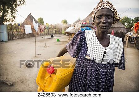 Nuer woman in compound, near Gambella, Western Ethiopia; Ethiopia View Large Photo Image Stock Image - Nuer woman in compound, near Gambella, Western Ethiopia; Ethiopia. Fotosearch