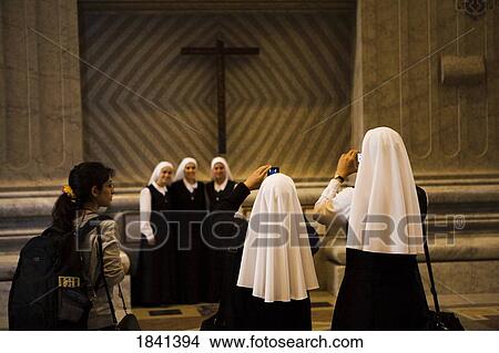 Nuns Photographing Each Other; Vatican City, Rome, Italy View Large Photo Image Picture - Nuns Photographing Each Other; Vatican City, Rome, Italy. Fotosearch