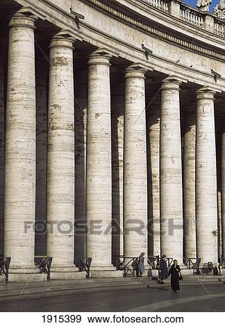 Stock Photo - Nuns Walking Into Piazza San Pietro. Fotosearch