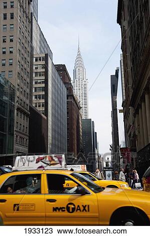 Stock Image - Ny Taxis And Views Of The Crysler Building, Murray Hill, Manhattan, New York, Usa. Fotosearch