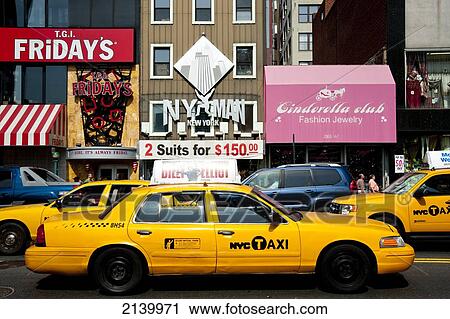 Ny Taxis In A Commercial Area In Manhattan, New York, Usa View Large Photo Image Stock Image - Ny Taxis In A Commercial Area In Manhattan, New York, Usa. Fotosearch