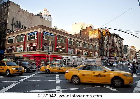 Stock Image - Ny Taxis In Chinatown, Manhattan, New York, Usa. Fotosearch
