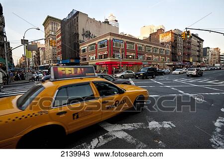 Stock Image - Ny Taxis In Chinatown, Manhattan, New York, Usa. Fotosearch