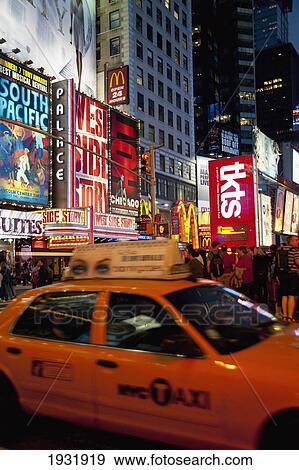 Ny Taxis In Times Square, Manhattan, New York, Usa View Large Photo Image Stock Photo - Ny Taxis In Times Square, Manhattan, New York, Usa. Fotosearch