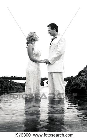 Oahu, Hawaii, Young Couple Both Holding Eachother. View Large Photo Image Stock Image - Oahu, Hawaii, Young Couple Both Holding Eachother.. Fotosearch