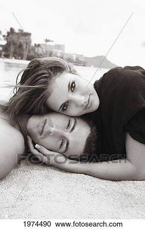 Oahu, Hawaii, Young Couple Both Holding Eachother. View Large Photo Image Stock Image - Oahu, Hawaii, Young Couple Both Holding Eachother.. Fotosearch