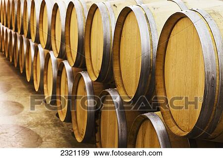 Oak Wine Barrels In A Wine Cellar; Niagara-On-The-Lake Ontario Canada View Large Photo Image Stock Photo - Oak Wine Barrels In A Wine Cellar; Niagara-On-The-Lake Ontario Canada. Fotosearch