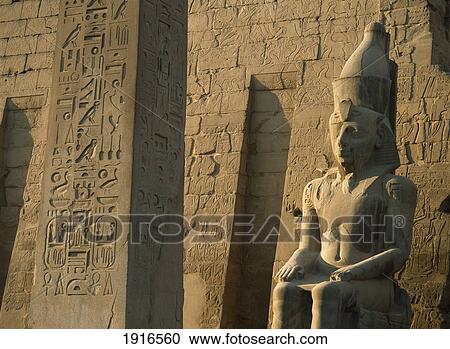 Stock Image - Obelisk And Colossus Of Ramses 2Nd. Fotosearch