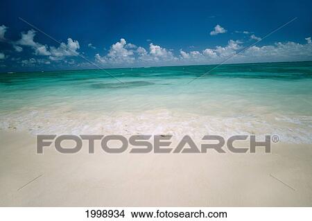 Ocean, Blue Sky And Sand, Clouds On Horizon B1483 View Large Photo Image Picture - Ocean, Blue Sky And Sand, Clouds On Horizon B1483. Fotosearch