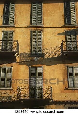 Stock Image - Ochre Colored House. Fotosearch
