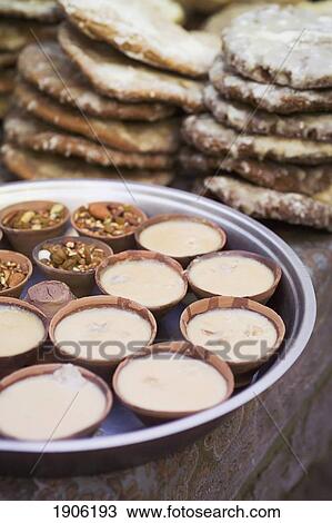 Offering Food, Mid Section, Close Up, Nadhwara, Rajasthan, India View Large Photo Image Stock Image - Offering Food, Mid Section, Close Up, Nadhwara, Rajasthan, India. Fotosearch
