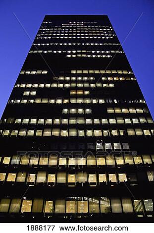 Office Building With Lights On At Dusk View Large Photo Image Stock Photo - Office Building With Lights On At Dusk. Fotosearch