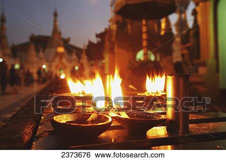 Oil candles at Shwedagon Pagoda; Yangon, Burma View Large Photo Image Stock Photograph - Oil candles at Shwedagon Pagoda; Yangon, Burma. Fotosearch