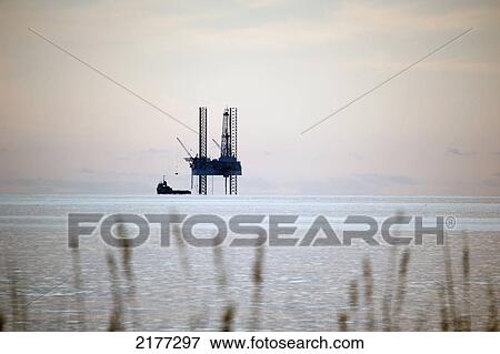 Oil Rig In The Gulf Of Mexico; Gulf Shores Alabama United States Of America View Large Photo Image Stock Photo - Oil Rig In The Gulf Of Mexico; Gulf Shores Alabama United States Of America. Fotosearch