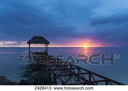 Old abandoned pier at dusk; Republic of Mauritius View Large Photo Image Stock Image - Old abandoned pier at dusk; Republic of Mauritius. Fotosearch