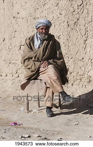 Old Afghan Man In Pol-E Matak, Parwan Province, Afghanistan View Large Photo Image Stock Image - Old Afghan Man In Pol-E Matak, Parwan Province, Afghanistan. Fotosearch