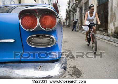 Stock Image - Old American Car Parked In Street. Fotosearch