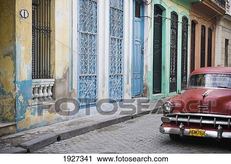 Stock Image - Old American Car Parked In Street. Fotosearch