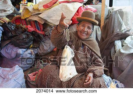 Picture - Old Aymara Woman Selling Chu. Fotosearch