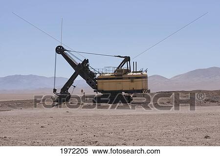 Stock Photography - Old Backhoe By The Highway To Calama, Chacabuco, Antofagasta Region, Chile. Fotosearch