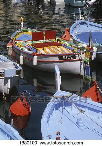 Stock Image - Old Boats In Harbor. Fotosearch
