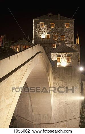 Stock Image - Old Bridge (Stari Most) Over The Neretva River At Night In Mostar, Herzegovina-Neretva, Bosnia And Herzegovina. Fotosearch