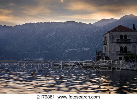 Stock Image - Old Building And Baosts At Dusk, Perast Monte. Tif. Fotosearch