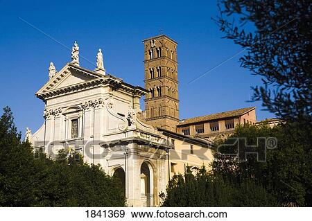 Stock Photo - Old Building With Church In The Background; Rome, Italy. Fotosearch
